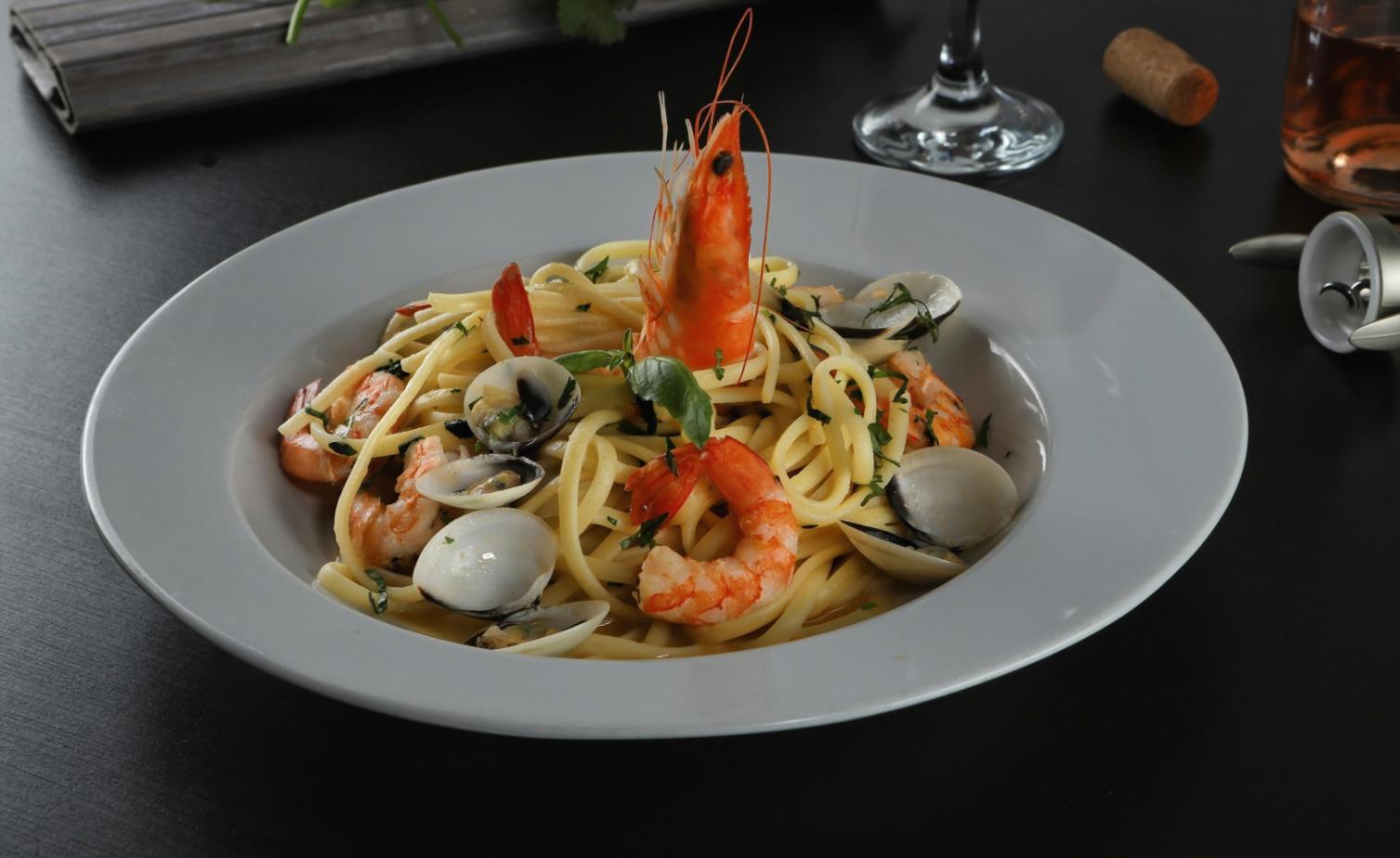 Professional kitchen environment with plating station setup